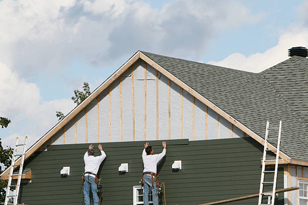 Professional Siding Installation technician working in Garner, NC